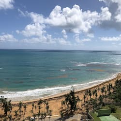 On the beach, sun loungers, beach towels