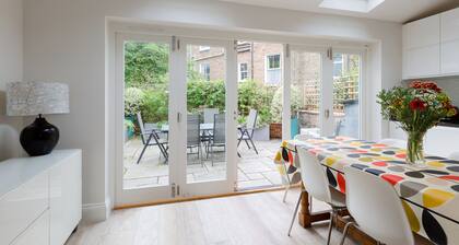 Central, stylish London family townhouse with private terrace on quiet street