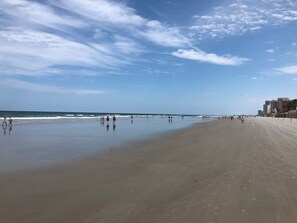On the beach, sun-loungers, beach towels