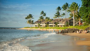 Enjoy ocean views from your balcony, with access to the beach and soothing sound of waves.