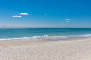 A beach with clear skies and calm waters. - Shore Blessed - 4BR Home with Great Ocean Views! (North Topsail Beach)