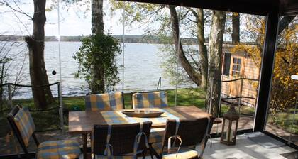 Bungalow directly on the lake with conservatory, very private - Ferienhof Löschebrand