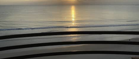 On the beach, sun-loungers, beach towels