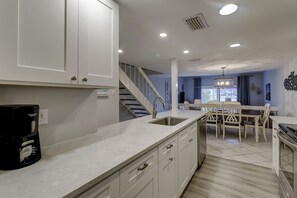 Fridge, microwave, dishwasher, coffee/tea maker