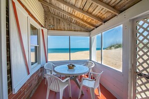 Outdoor dining - 5452- Sea Captain's Cottage, Charming Old Nags Head Cottage on the Oceanfront (Nags Head)