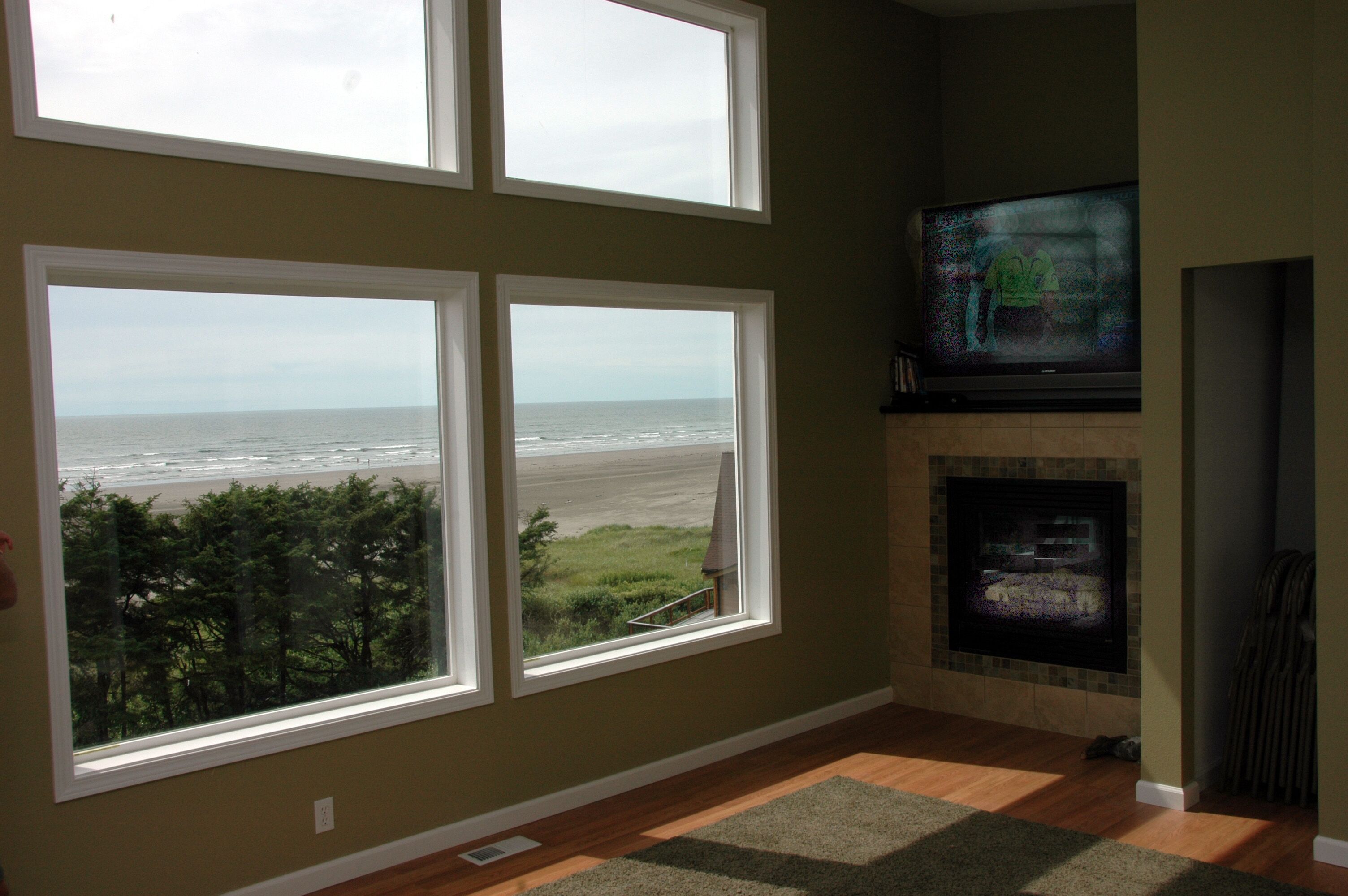 Upper view, large screen TV and fireplace