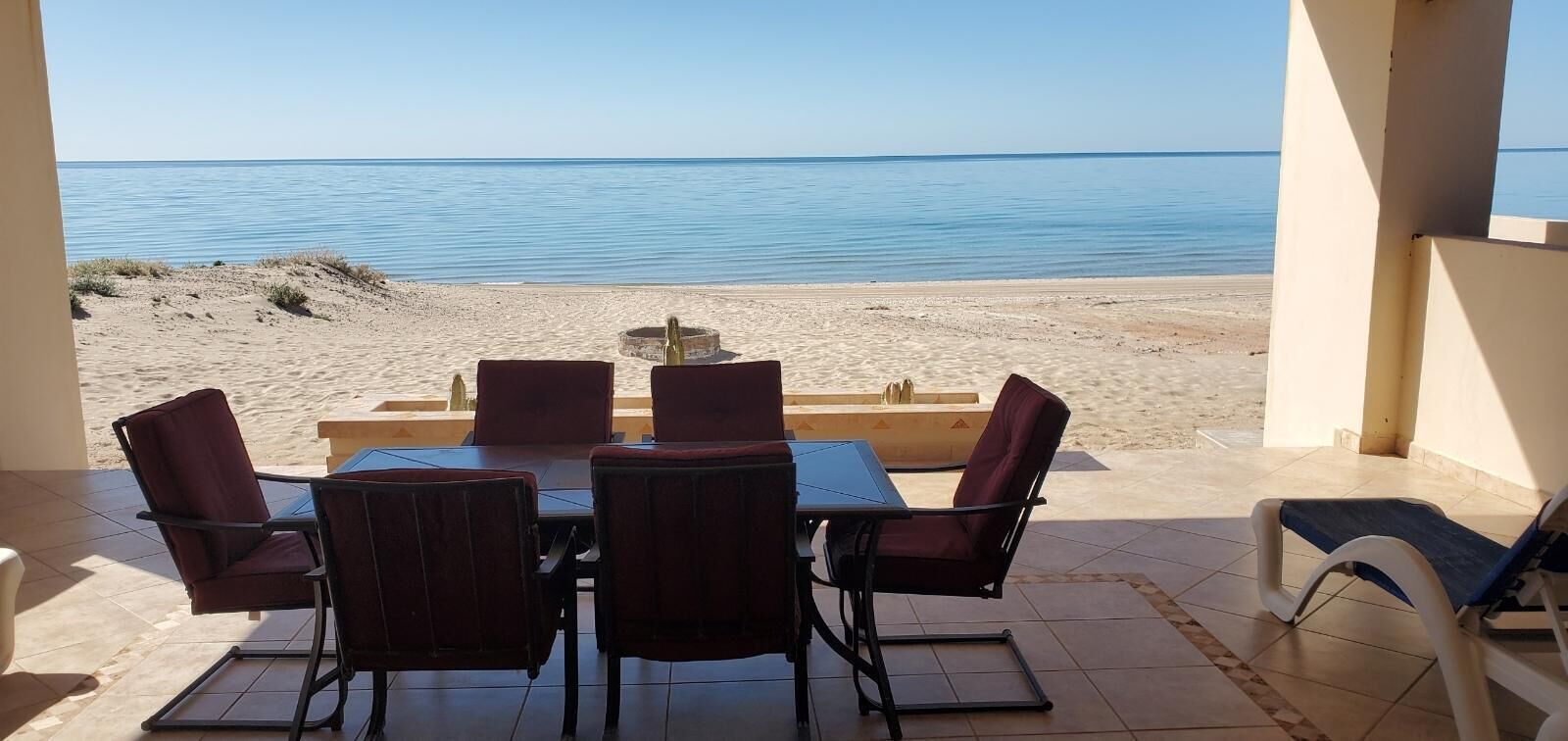 Plenty of seating ans lounge chairs on beachfront patios