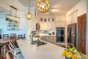 Fridge, microwave, oven, stovetop - 5587- The Sea's Embrace, Beautiful decor & beautiful ocean views at this Nags Head townhome! (Nags Head)