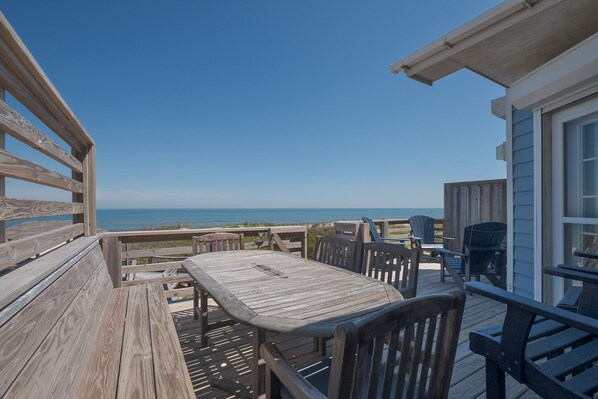Outdoor dining - 5587- The Sea's Embrace, Beautiful decor & beautiful ocean views at this Nags Head townhome! (Nags Head)