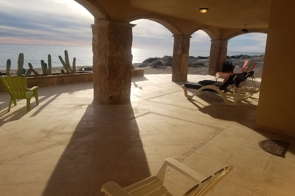 Peace, quiet, sand, surf.