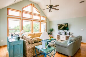 Televisión LCD, reproductor de DVD, libros y estéreo 