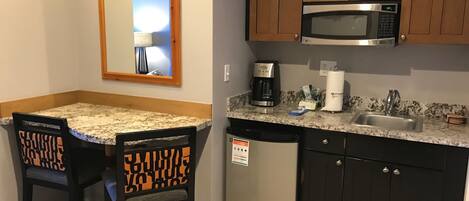 Microwave, coffee/tea maker, toaster, cookware/dishes/utensils