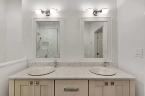 Bathtub, hair dryer, towels, soap