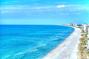 On the beach, sun-loungers, beach towels