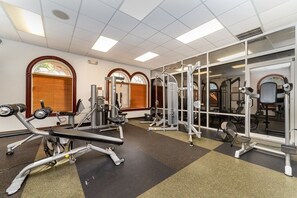 Stay fit on the go with our fully equipped gym featuring weight benches, treadmills, and free weights.