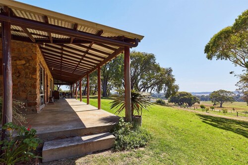 The Homestead driveway is located on the right, just passed the winery.