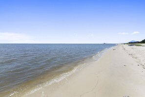 On the beach, sun-loungers, beach towels