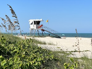 On the beach, sun-loungers, beach towels