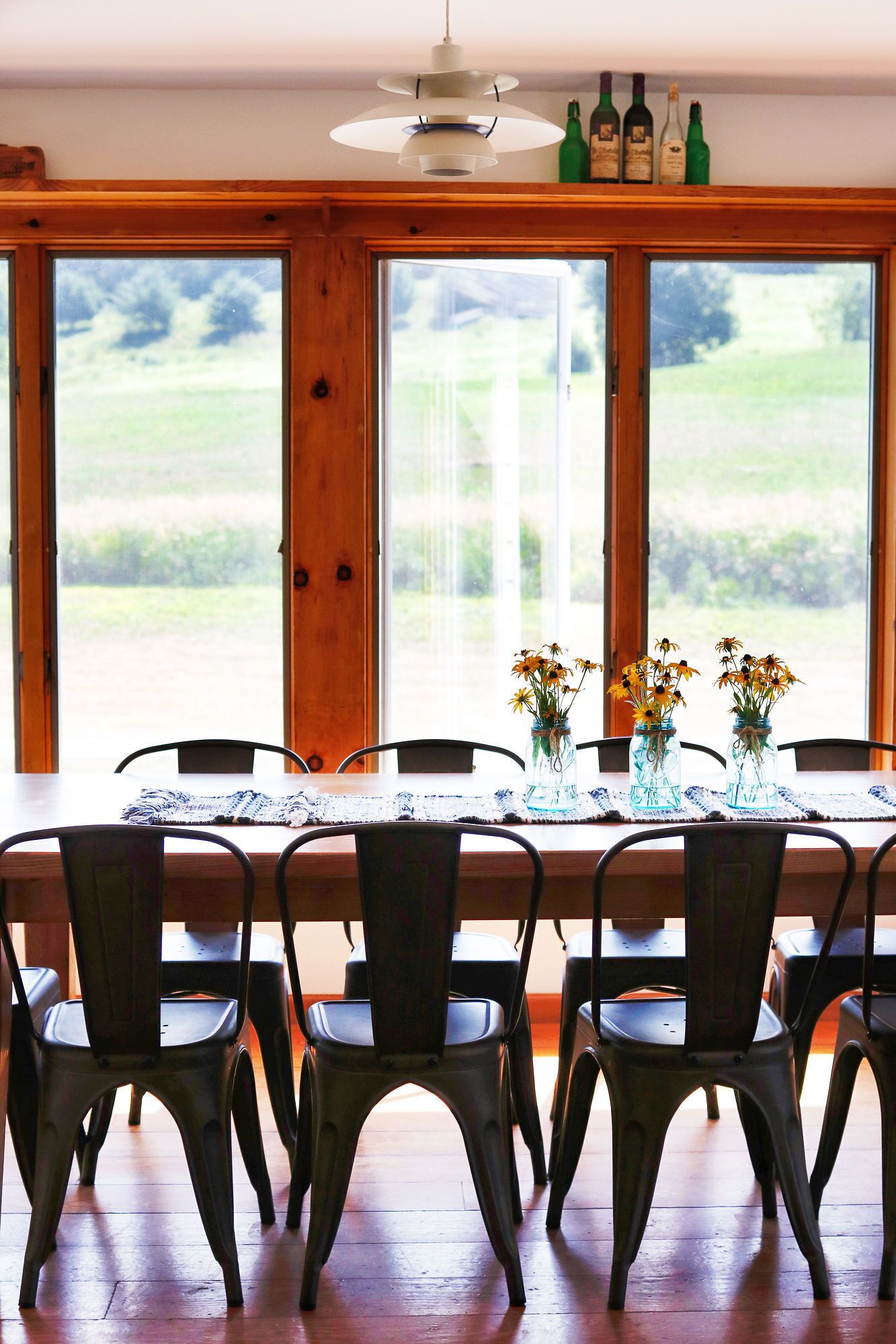 The Sun Room features a locally handcrafted farm table that comfortably seats 14