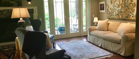 TV, fireplace, books