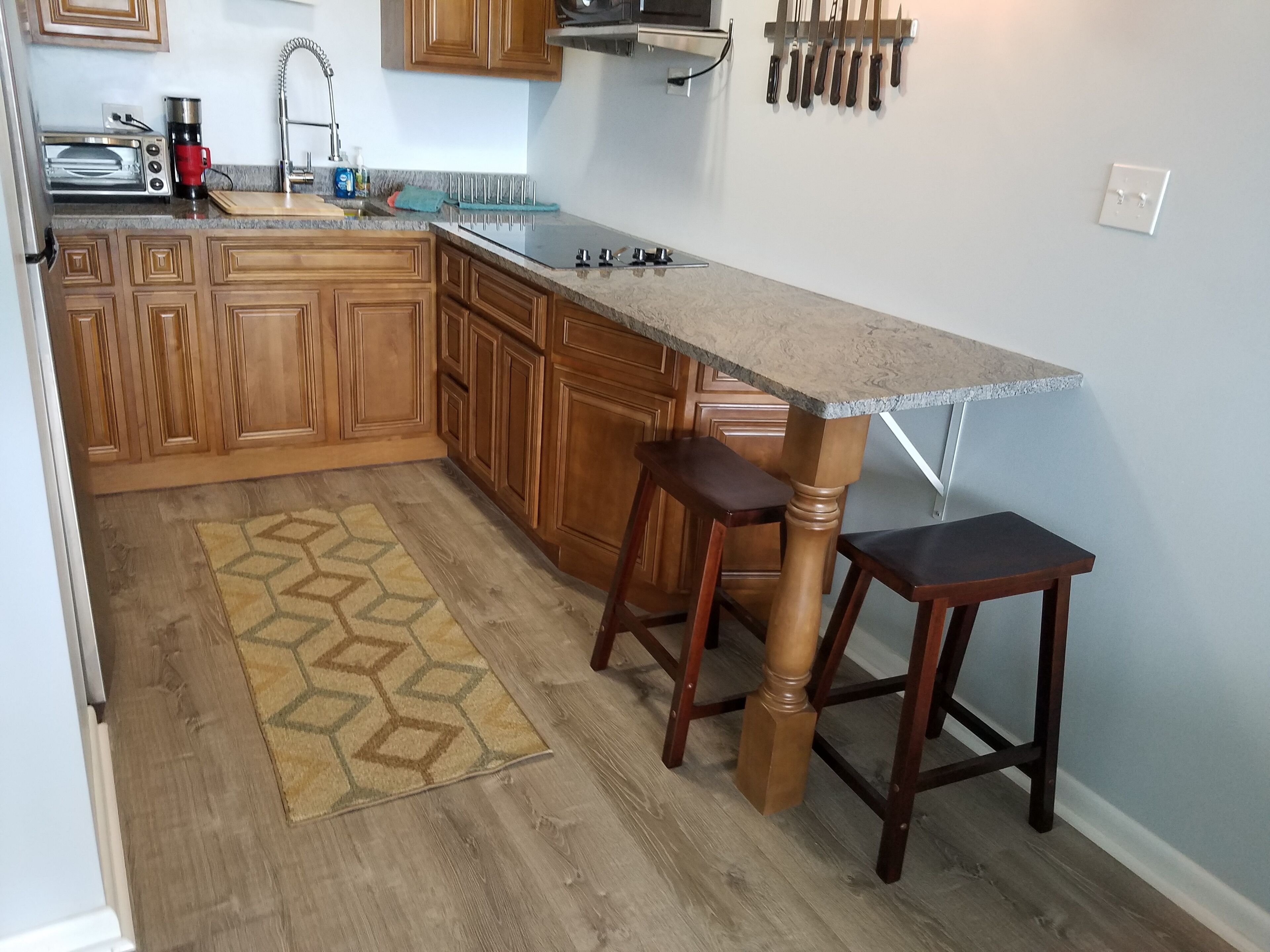 Fridge, microwave, stovetop, coffee/tea maker