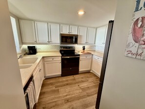 Fridge, microwave, stovetop, dishwasher - 3BR/2BA South Tower -It's All About the View!! 2 Kings + 2 Twins + Beach Locker! (Myrtle Beach)
