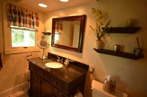 Combined shower/tub, hair dryer, towels, soap