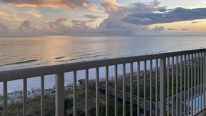 A coastal view from a balcony with a railing, ocean, and a wooden boardwalk leading to a beach. - Luxury at it's finest! Penthouse unit overlooking the beautiful Gulf of Mexico! (Fort Walton Beach)