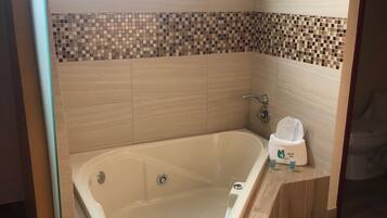 Deluxe Room, Hot Tub | Jetted bathtub