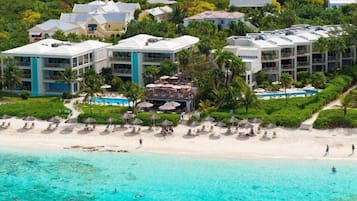 On the beach, sun-loungers, beach towels