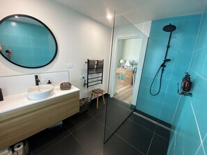 Shower, hair dryer, towels, soap