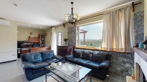 Taulutelevisio, takka, tulostin