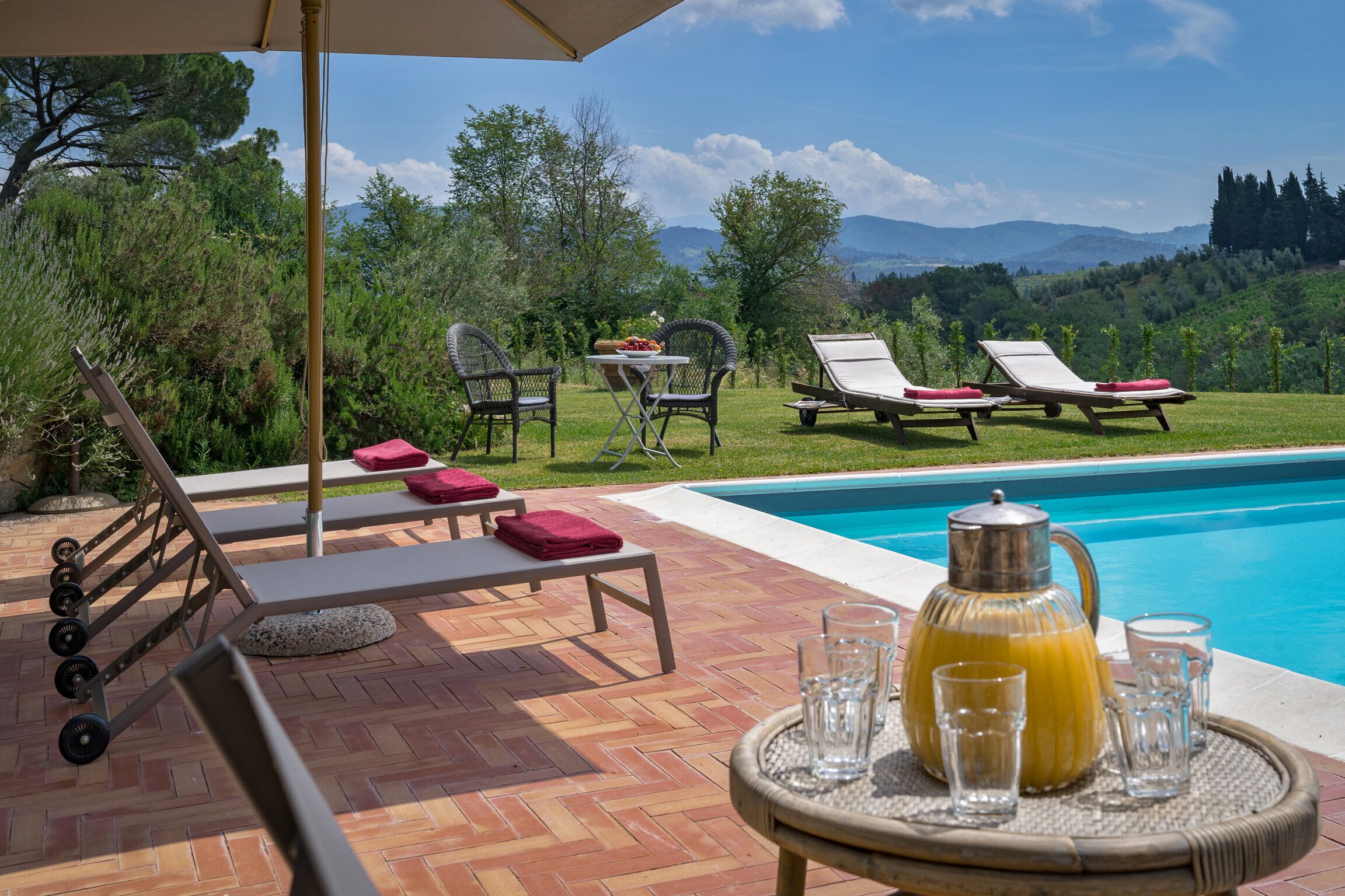Outdoor pool, a heated pool, sun loungers