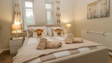 4 bedrooms, desk, iron/ironing board, travel cot