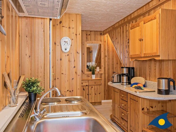 Fridge, coffee/tea maker, electric kettle, toaster