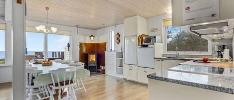 Fridge, stovetop, dishwasher, coffee/tea maker