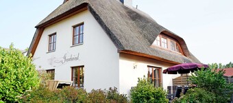 Holiday home with fireplace and sauna