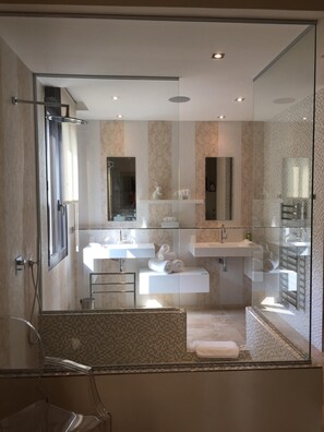 Shower, hair dryer, towels, soap