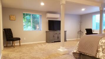 1 bedroom, desk, iron/ironing board, travel crib