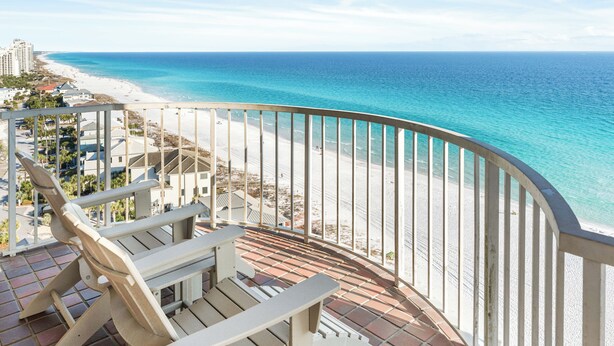 A balcony with a view of a beach and ocean. - Spectacular Views-Gulf Front Corner unit - Hidden Dunes Gulfside 1506 (Miramar Beach)