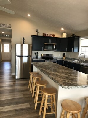 New flooring, cabinets and appliances.