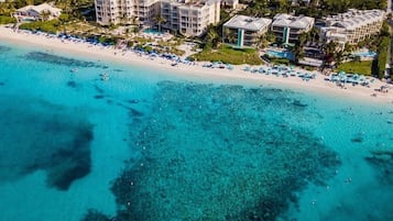 On the beach, sun loungers, beach towels