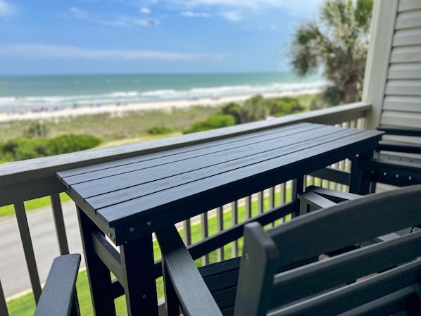 A wooden deck with a view of the beach and ocean. - On Private Beach, Amazing View 2BR 2BA OFV Condo (Myrtle Beach)