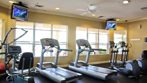 A gym with treadmills, elliptical machines, and weight equipment. - Top floor on Disney's doorstep - Great location (Kissimmee)