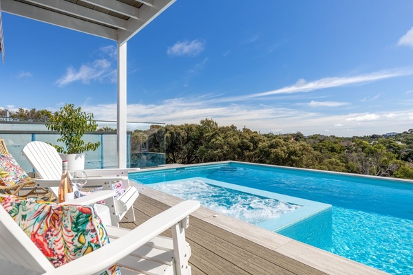 Solar and gas heated mineral pool and spa located on the front deck.