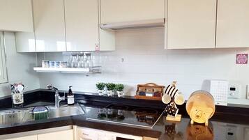 Fridge, microwave, stovetop, coffee/tea maker