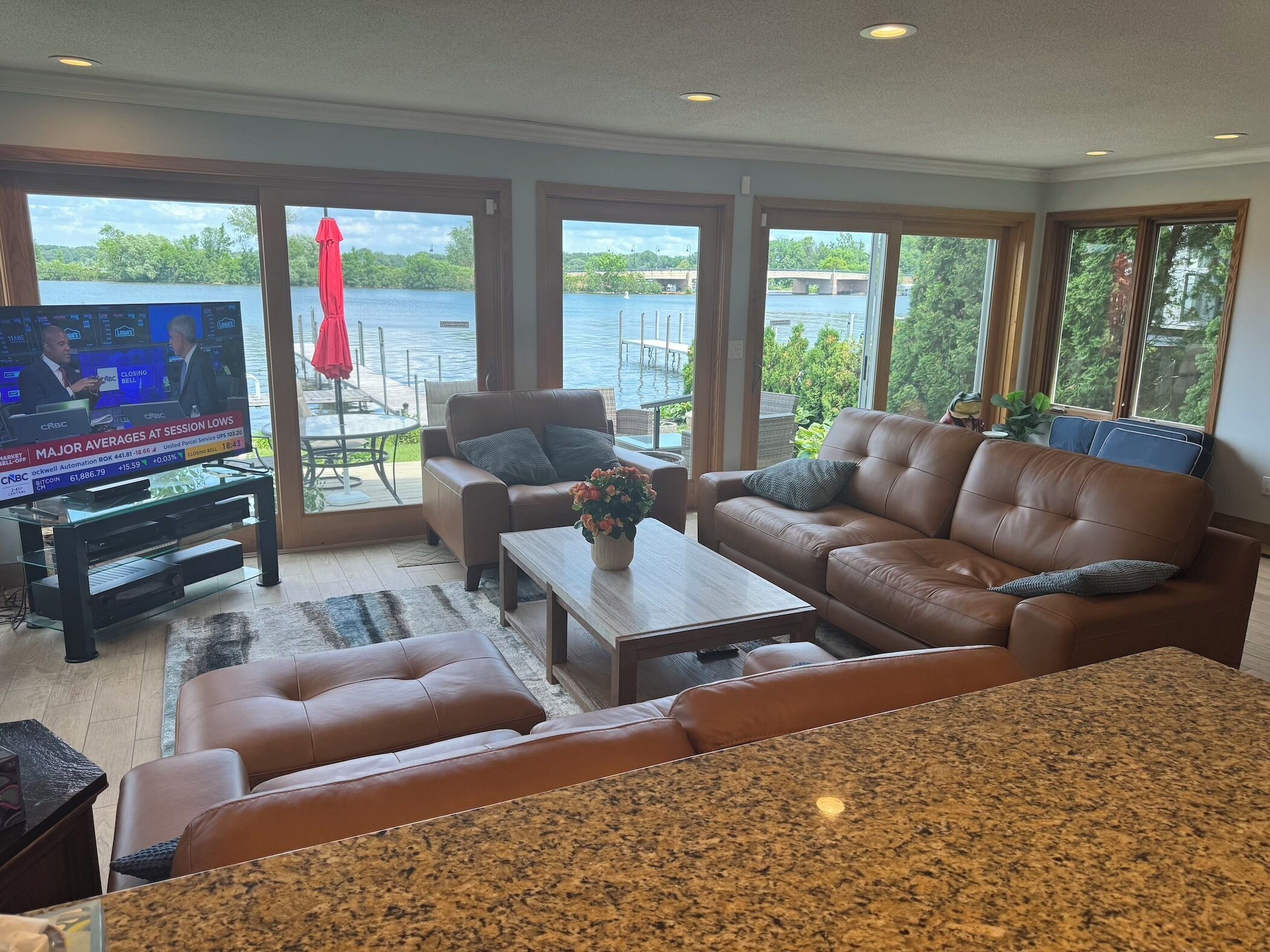 NEW LEATHER FURNITURE & AREA RUG, TV , 60” and COFFEE TABLE