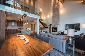 Smart TV, fireplace, books, video library