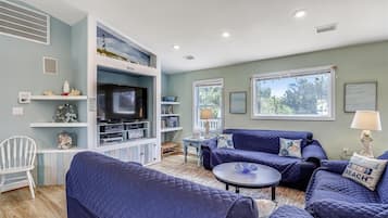 Télévision, lecteur de DVD, baby-foot, chaßne hi-fi