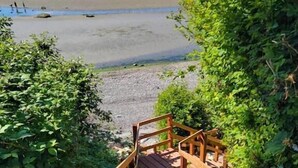 A wooden staircase leading to a beach with a view of the ocean. - On the beach!! Oceanfront luxury - Incredible Views and Private Beach Access (Blaine)